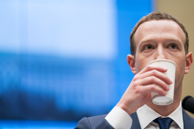 Facebook co-founder and CEO Mark Zuckerberg testifies before a House Energy and Commerce Committee hearing on transparency and use of consumer data on Capitol Hil in Washington, DC on April 11, 2018. (UPI-Yonhap)