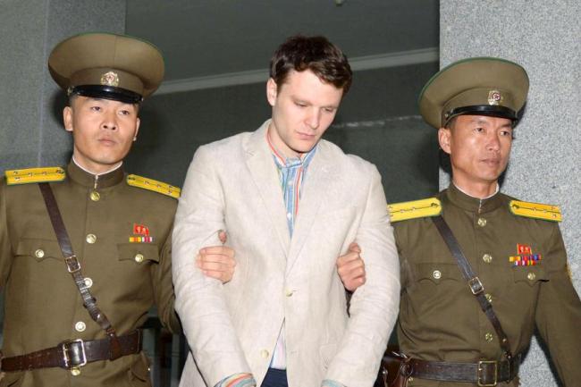 Otto Frederick Warmbier (C), a University of Virginia student who was detained in North Korea, is taken to North Korea's top court in Pyongyang, in this photo released by Kyodo March 16, 2016. (Reuters)