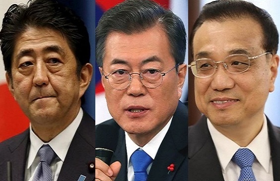 Japanese Prime Minister Shinzo Abe (left), President Moon Jae-in (center) and Chinese Premier Li Keqiang. (Reuters)