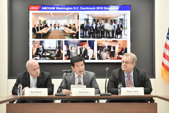 From left: Former AmCham Chairman David Ruch, incumbent Chairman & CEO James Kim and Jeffrey Jones, chairman of the board of governors, hold a press briefing in Seoul on Tuesday. (AmCham)