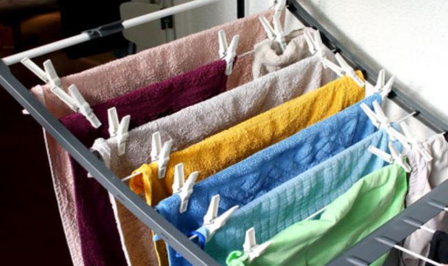 Towels hang from a drying rack. This photo is not associated with the events the article. (Yonhap)