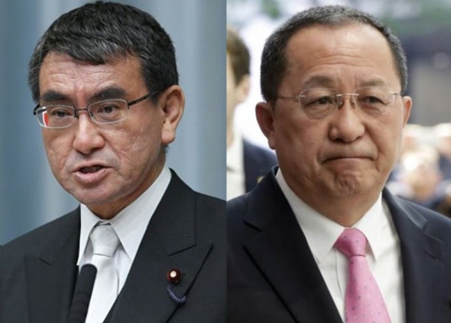 Japanese Foreign Minister Taro Kono, left, and North Korean Foreign Minister Ri Yong-ho (AP)