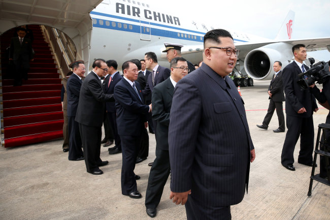 Kim Jong-un at the Changi International Airport. (AP-Yonhap)