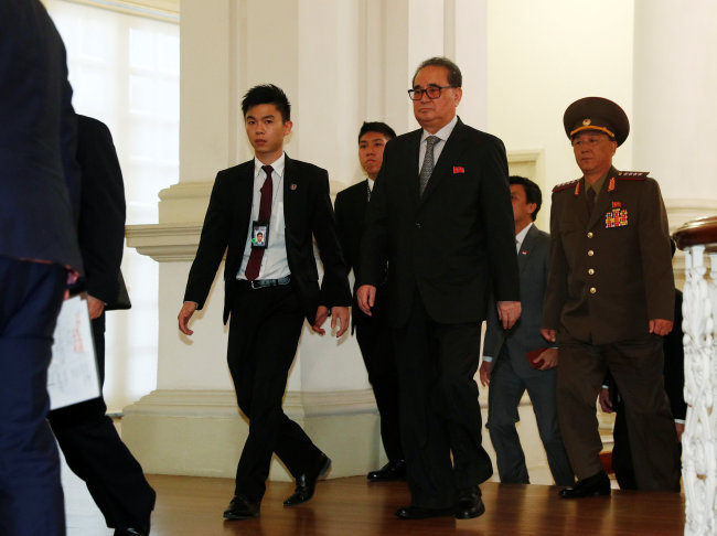 Ri Su-yong, a member of the North Korean delegation, walks in the Istana. (Reuters-Yonhap)