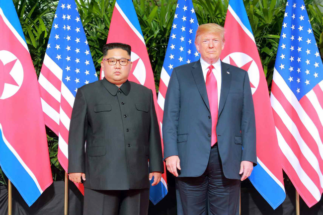 North Korean leader Kim Jong-un (left) and US President Donald Trump (right) in Singapore. (Rodong Sinmun)