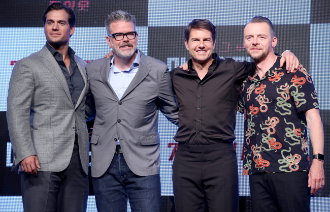 From left: Henry Cavill, director Christopher McQuarrie, Tom Cruise and Simon Pegg pose for a photo during a press conference for “Mission: Impossible – Fallout” in Seoul on Monday. (Yonhap)