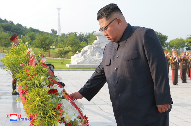 North Korean leader Kim Jong-un marked the 65th anniversary of the armistice with a visit to a cemetery for those who lost their lives in the 1950-53 Korean War. (KCNA-Yonhap)
