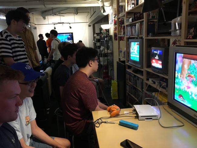 Gamers play “Super Smash Bros. Melee” matches at a monthly tournament in Seoul, July 15. (Aaron Shi/The Korea Herald)