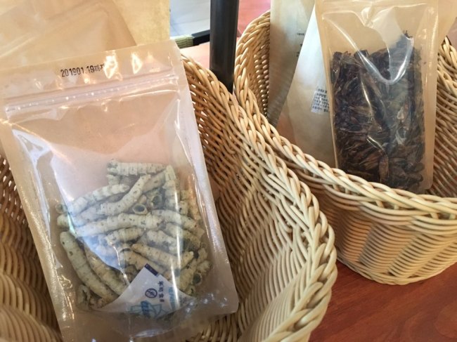 Packaged silkworms (left) and crickets (Im Eun-byel/The Korea Herald)