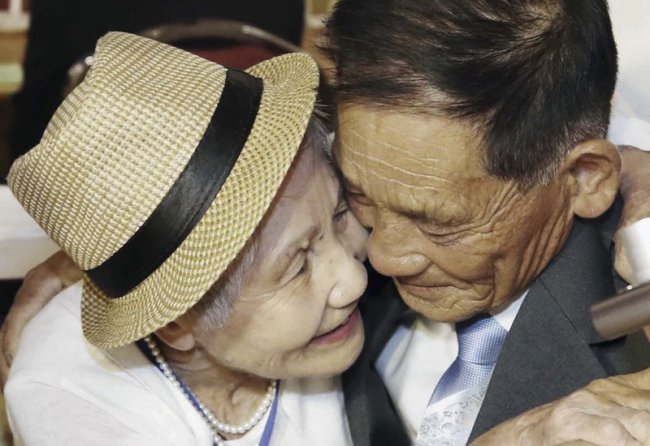 South Korean Lee Keum-seom, 92, left, hugs her North Korean son Ri Sang Chol, 71, during the Separated Family Reunion Meeting at the Diamond Mountain resort in North Korea, Monday, Aug. 20. (AP)