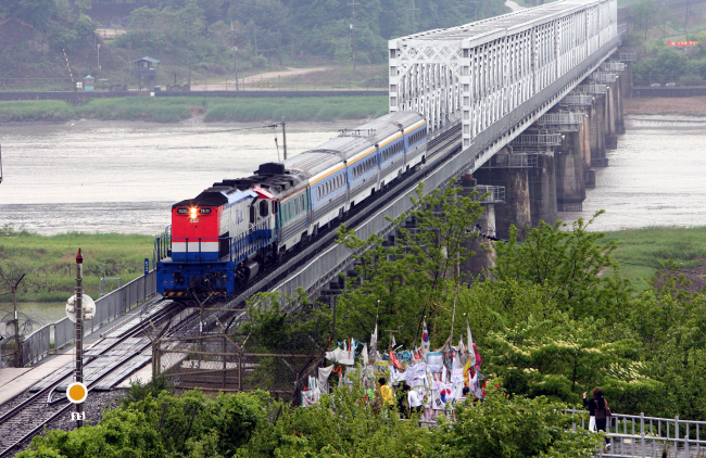 This photo taken in 2007 shows the two Koreas conducting a test trial of a cross-border railway. (Yonhap)