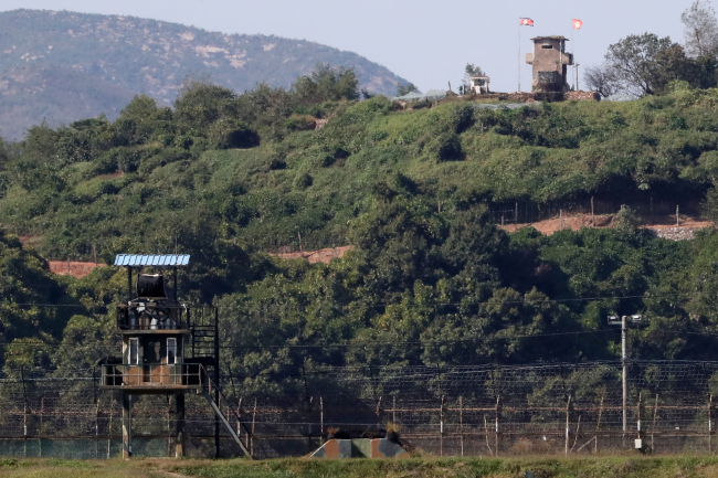 Two Koreas` guard posts stand each other across the DMZ. Yonhap