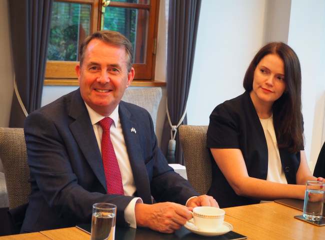 Liam Fox, British secretary of state for international trade, poses with Department for International Trade Commissioner for Asia-Pacific Natalie Black at the British Embassy in Seoul on Friday. (Joel Lee/The Korea Herald)