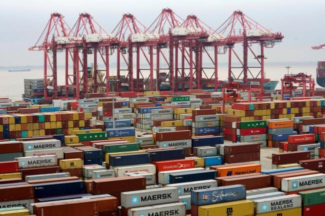 Containers are seen at the Yangshan Deep Water Port in Shanghai, China April 24. (Reuters)