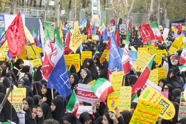 Iranians protest during demonstration marking the 39th anniversary of the 1979 United States Embassy takeover in front of former American embassy in Tehran, Iran on November 4, 2018. The anniversary of the takeover fell just hours before the United States was set to void the nuclear deal and restore all sanctions against Iran. (Maryam Rahmanian/UPI)