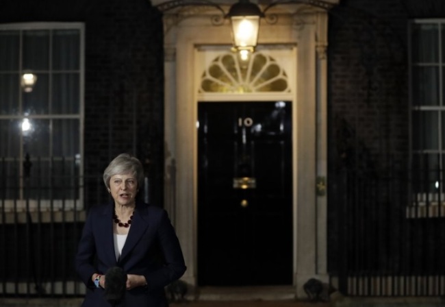 Britain`s Prime Minister Theresa May delivers a speech outside 10 Downing Street in London, Wednesday, Nov. 14, 2018. British Prime Minister Theresa May says Cabinet agrees draft Brexit deal with European Union after `impassioned` debate. (AP)