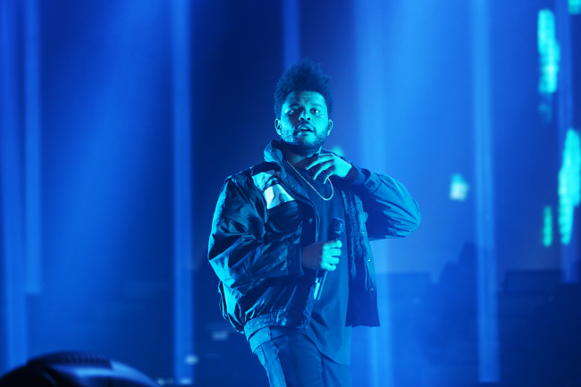 Canadian R&B artist The Weeknd performs at Gocheok Skydome in Seoul on Saturday. (Hyundai Card)