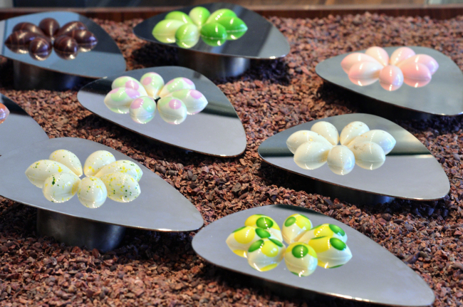 Adore Chocolaterie’s signature collection features nine colorful and eye-catching bonbons in flavors like banga, or Korean mint, green citron and caramel ginger and orange confit. (Park Hyun-koo/The Korea Herald)