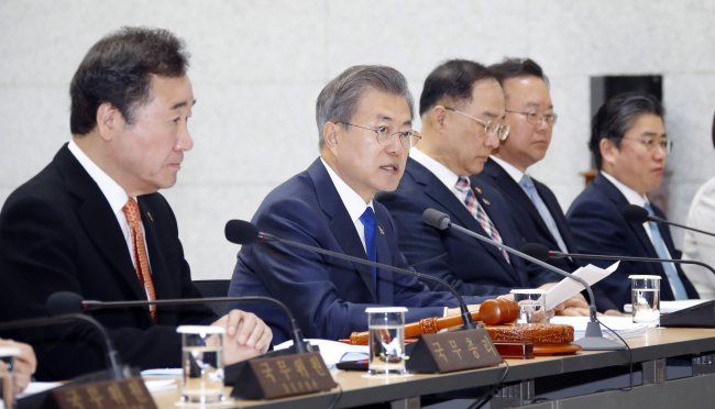 President Moon Jae-in speaks at the Cabinet meeting on Tuesday. Yonhap