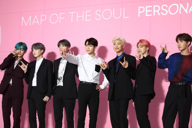 BTS poses before a press conference for “Map of the Soul: Persona,” in Seoul on Wednesday. From left are V, Suga, Jin, Jungkook, RM, Jimin and J-Hope. (Yonhap)