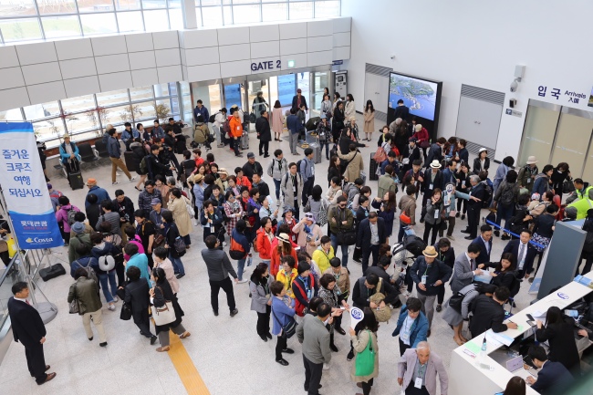 Passengers can be seen in the new cruise terminal in Incheon on Friday. (Incheon Port Authority)