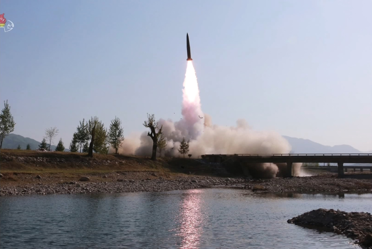 North Korea released a photo showing its launch of a short-range missile on Thursday. (Yonhap)