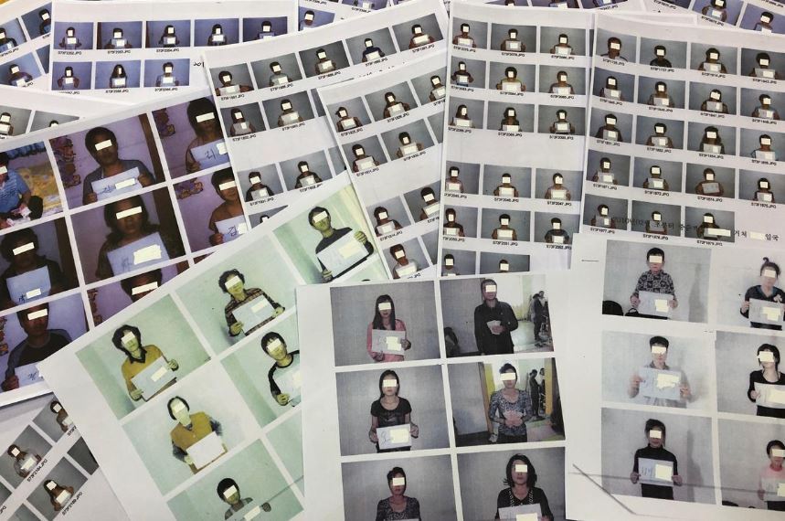 Photo sheets of the North Korean refugees helped by the North Korea Refugees Human Rights Association of Korea are displayed in Seoul, South Korea, June 11, 2019. (REUTERS)