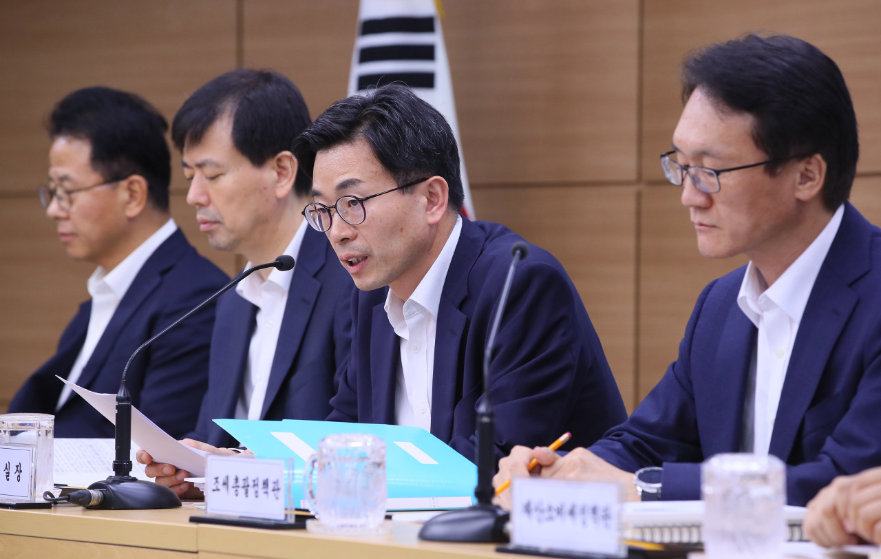 Officials from the Ministry of Finance and Economy attend a press briefing held Thursday. (Yonhap)