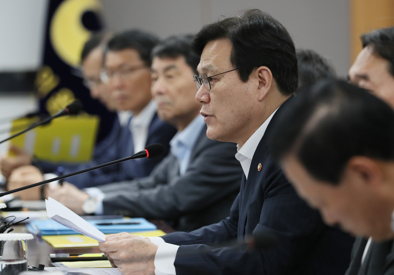 FSC Chairman Choi Jong-ku speaks at a meeting held at the government complex in Seoul on Saturday. (Yonhap)