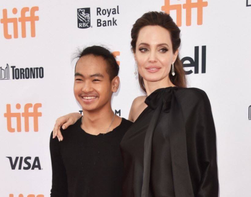 Angelina Jolie, right, and her son Maddox (AFP)