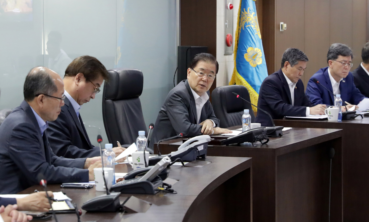 Aug. 2 photograph of national security director Chung Eui-yong and other officials at a National Security Council meeting. Yonhap