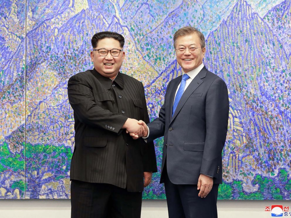 North Korea's leader Kim Jong-un (left) is pictured shaking hands with South Korea's President Moon Jae-in during the Inter-Korean summit in the Peace House building on the southern side of the truce village of Panmunjom, April 27, 2018. (KCNA)