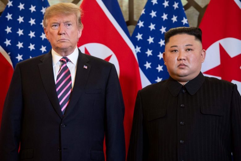 US President Donald Trump and North Korea's leader Kim Jong-un pose before a meeting at the Sofitel Legend Metropole hotel in Hanoi on Feb 27. (AFP)
