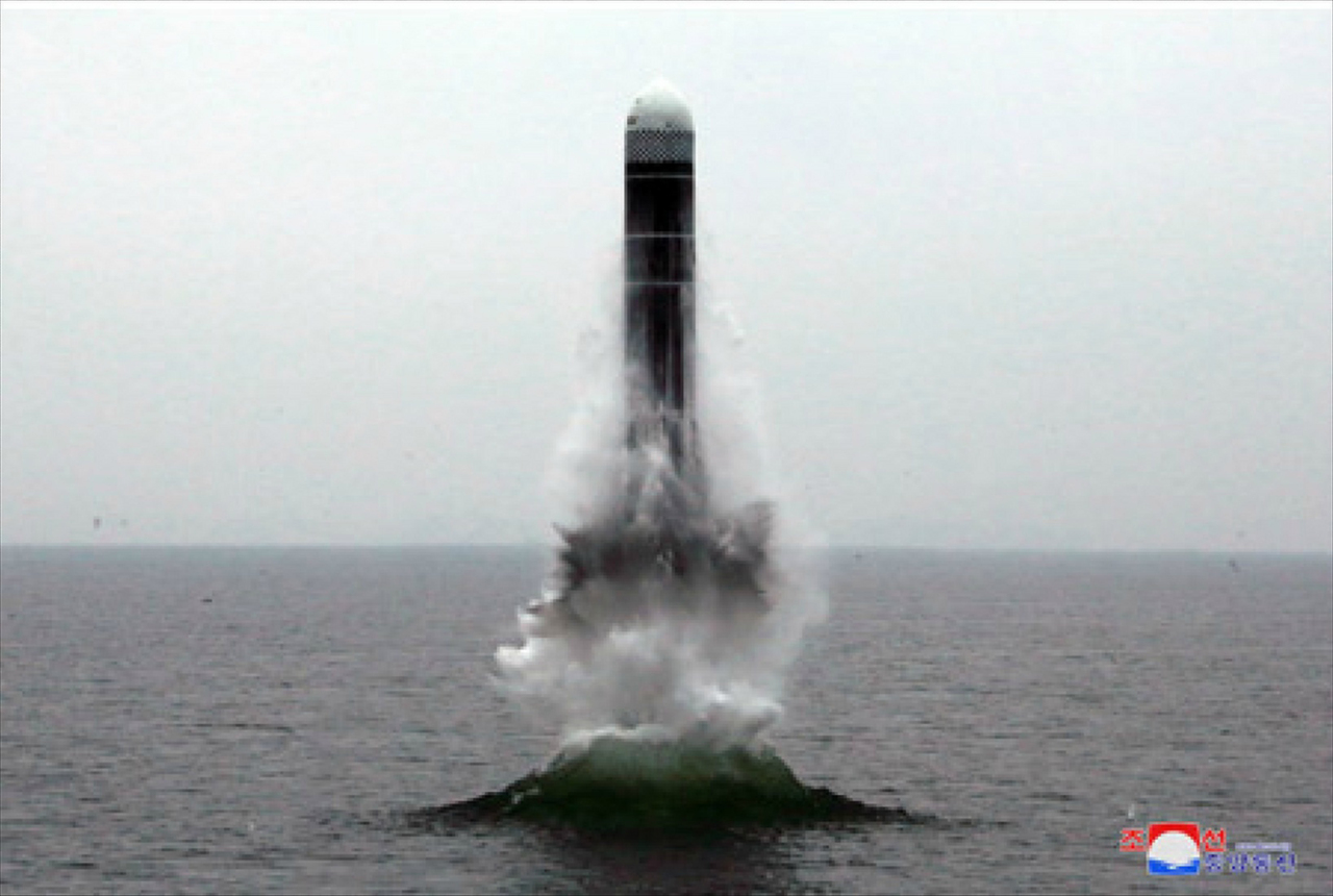 Photograph of the alleged submarine-launched ballistic missile being fired released by the North Korean state media. Yonhap