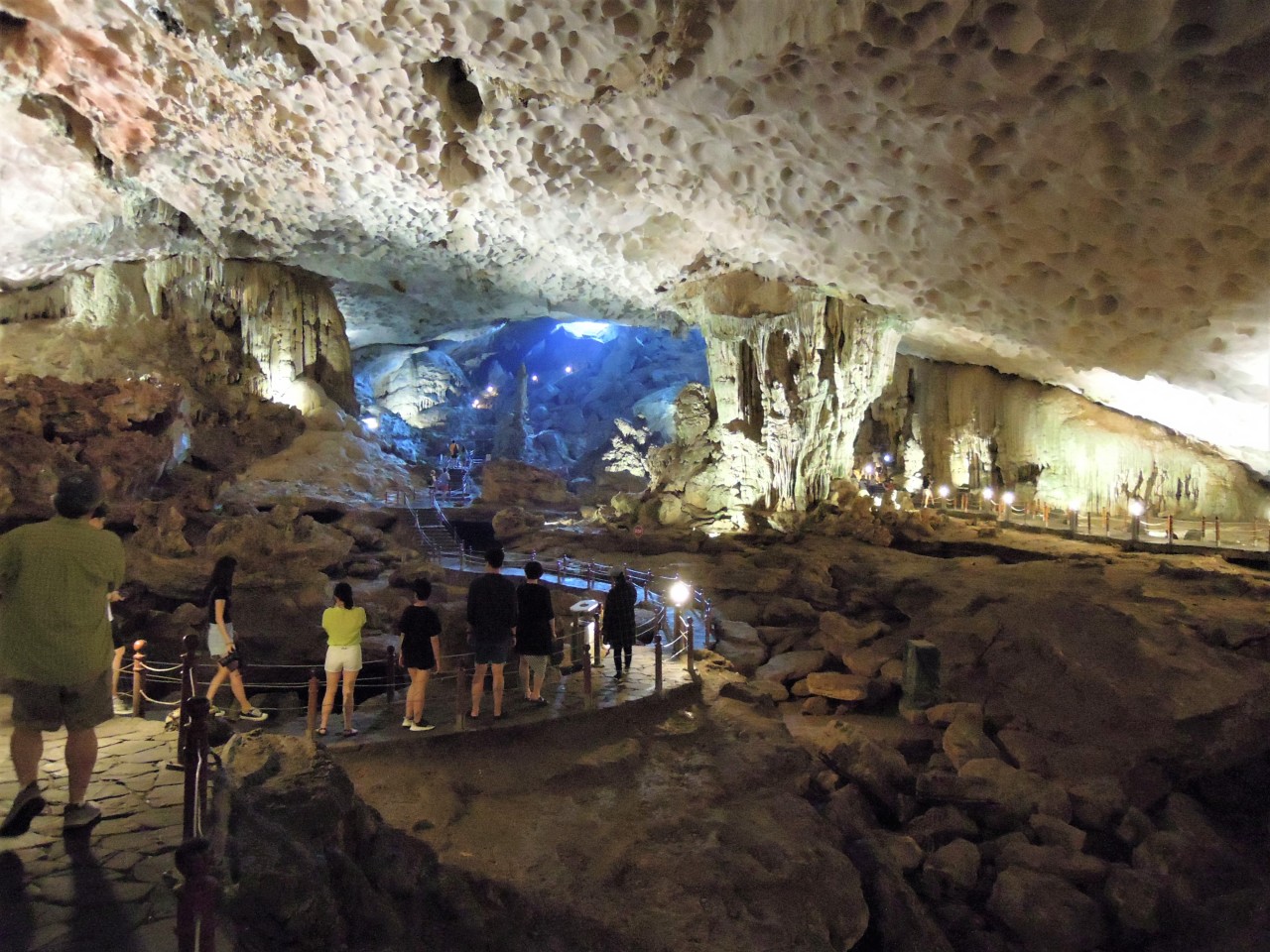 Visitors look around Sung Sot Cave in Halong Bay, Vietnam. (Paul Kerry/The Korea Herald)