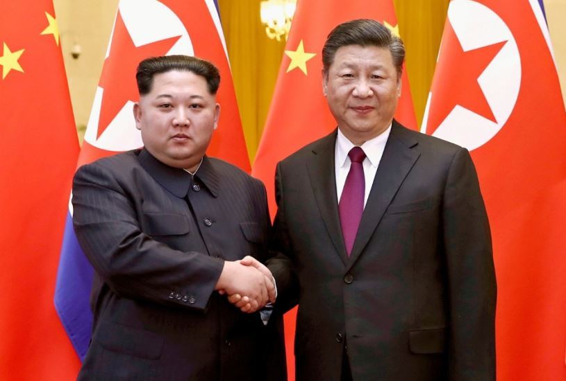 North Korean leader Kim Jong-un (left) and Chinese President Xi Jinping. (AP)