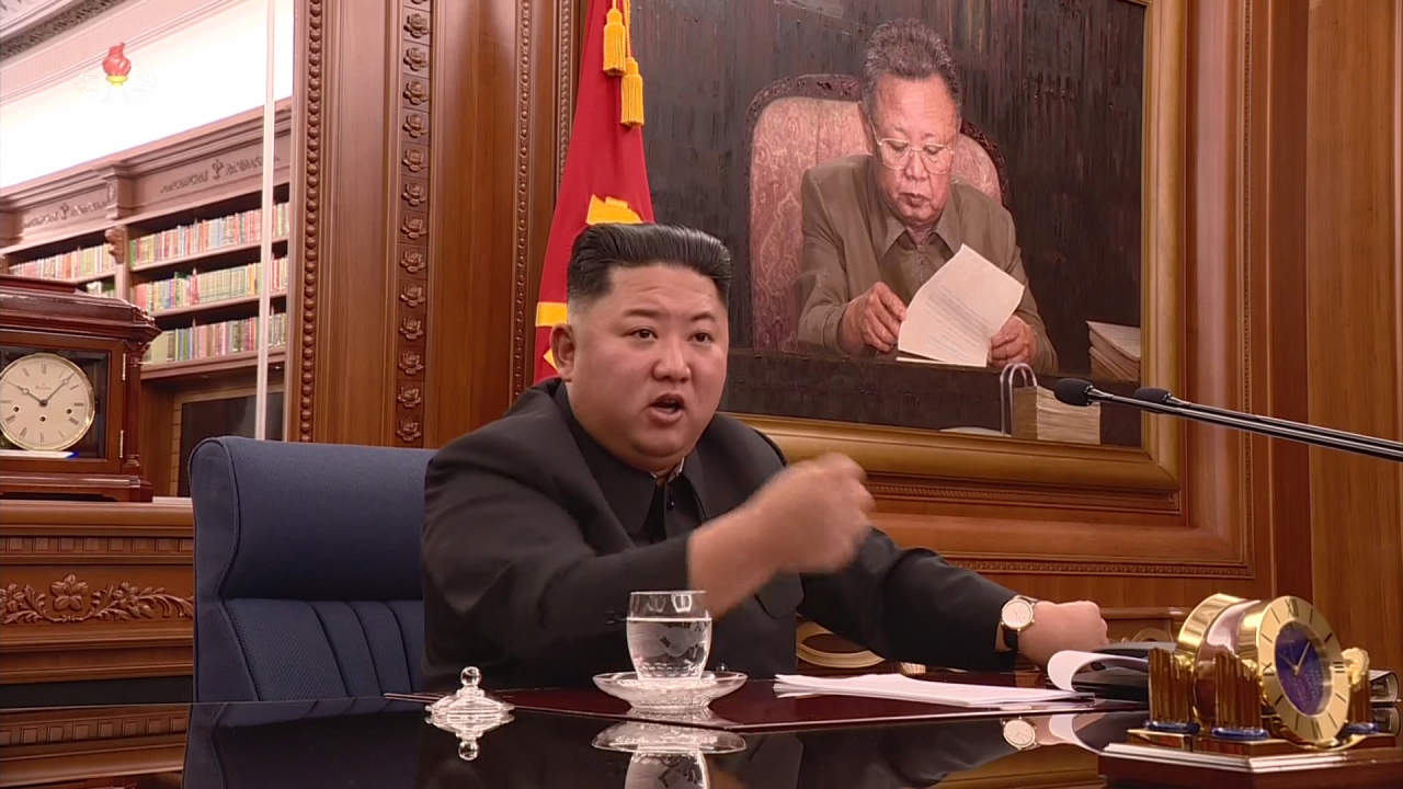 North Korean leader Kim Jong-un speaks at an enlarged meeting of the Workers Party's Central Military Commission in this photo released by the North's official Korean Central News Agency on Sunday. (Yonhap)