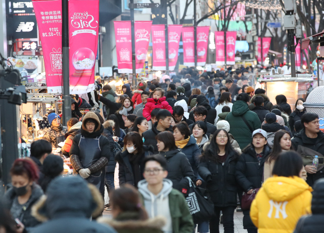 The Myeong-dong area of Seoul bustles with tourists during 2019’s Korea Grand Sale, an annual tourism festival that promotes shopping and tourism in the city. (Yonhap)