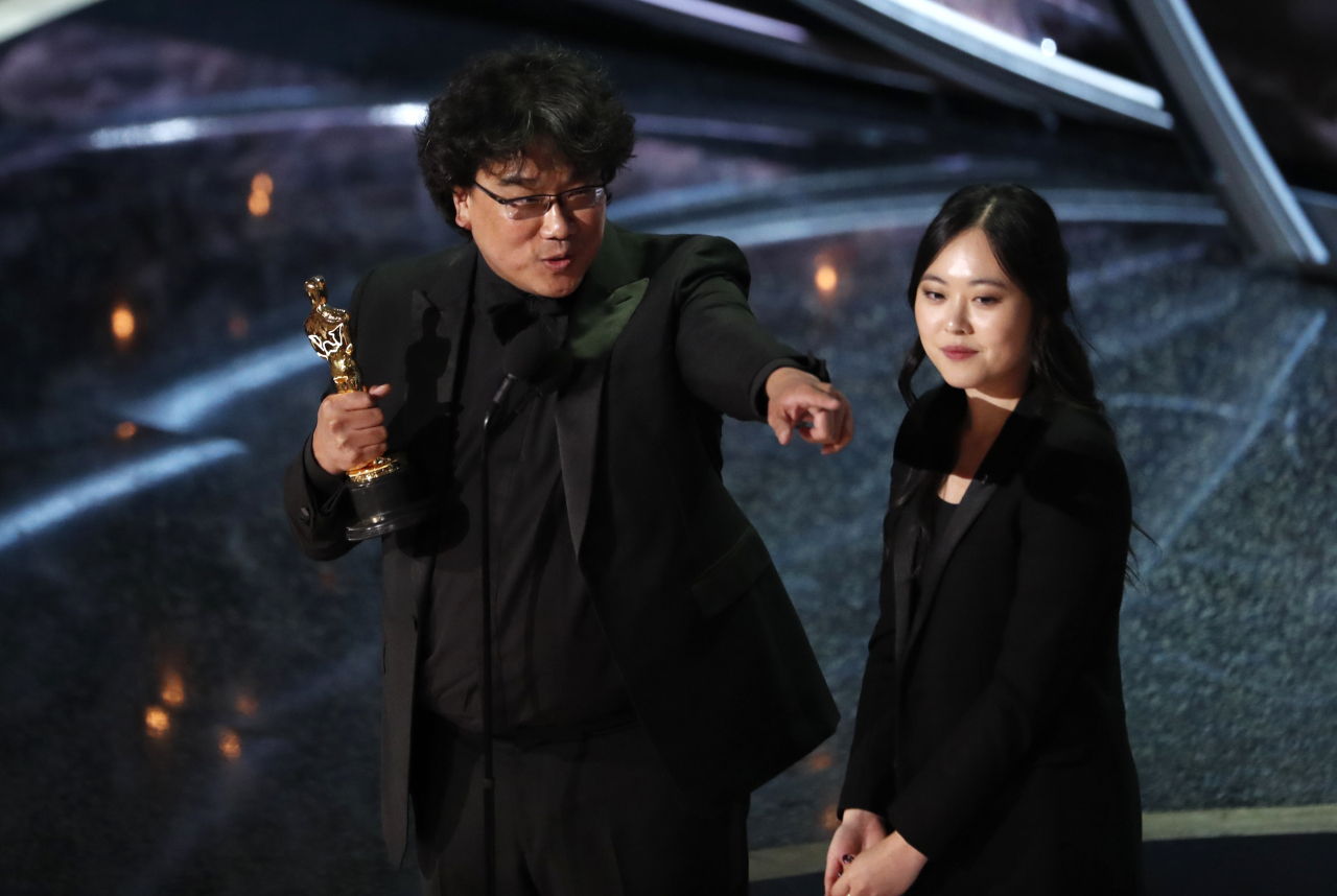 Director Bong Joon-ho accepts the Oscar for best foreign language film for 