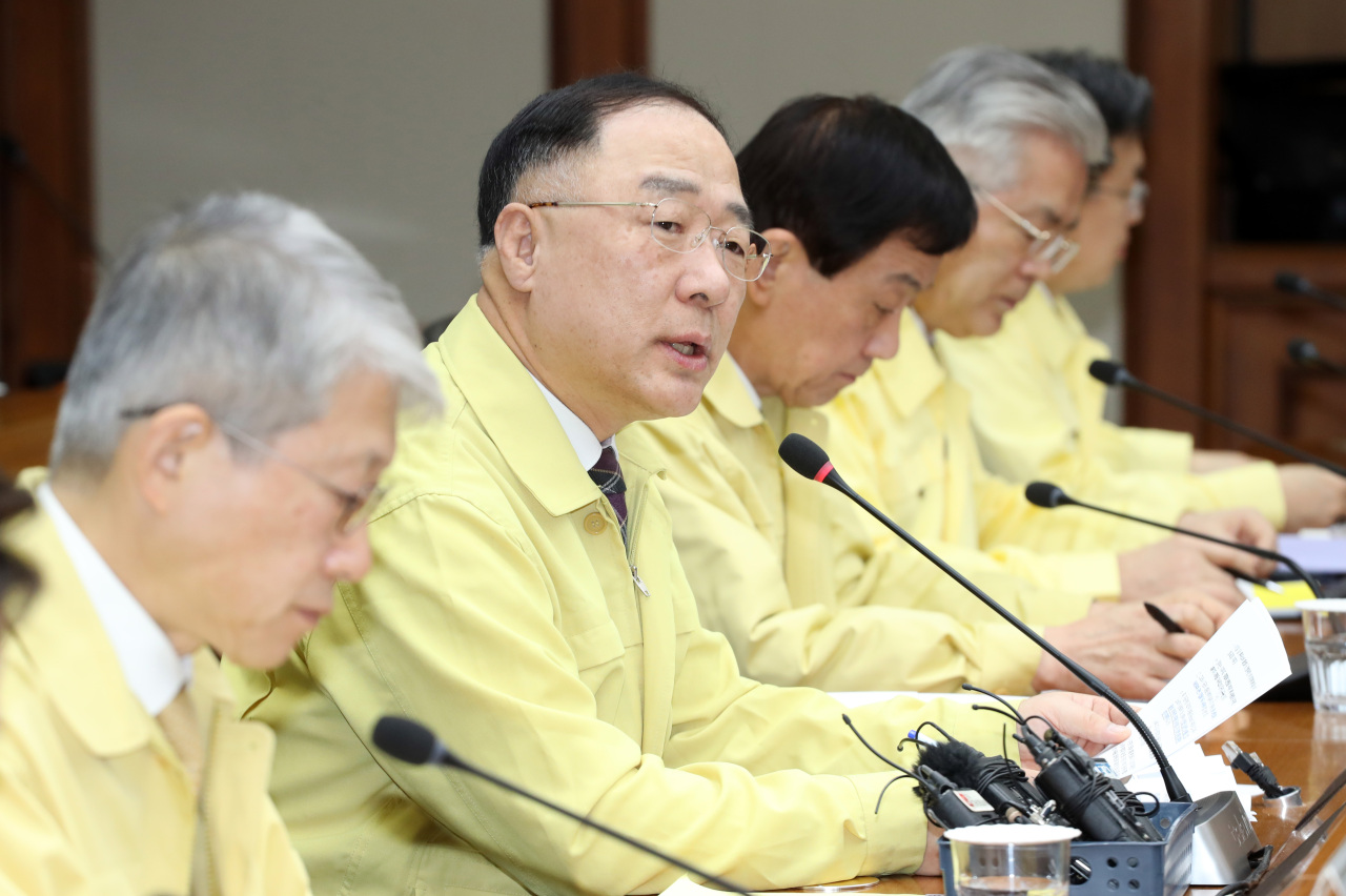 Deputy Prime Minister and Finance Minister Hong Nam-ki speaks Wednesday in a meeting of economy-related ministers at the Export-Import Bank of Korea. (Yonhap)