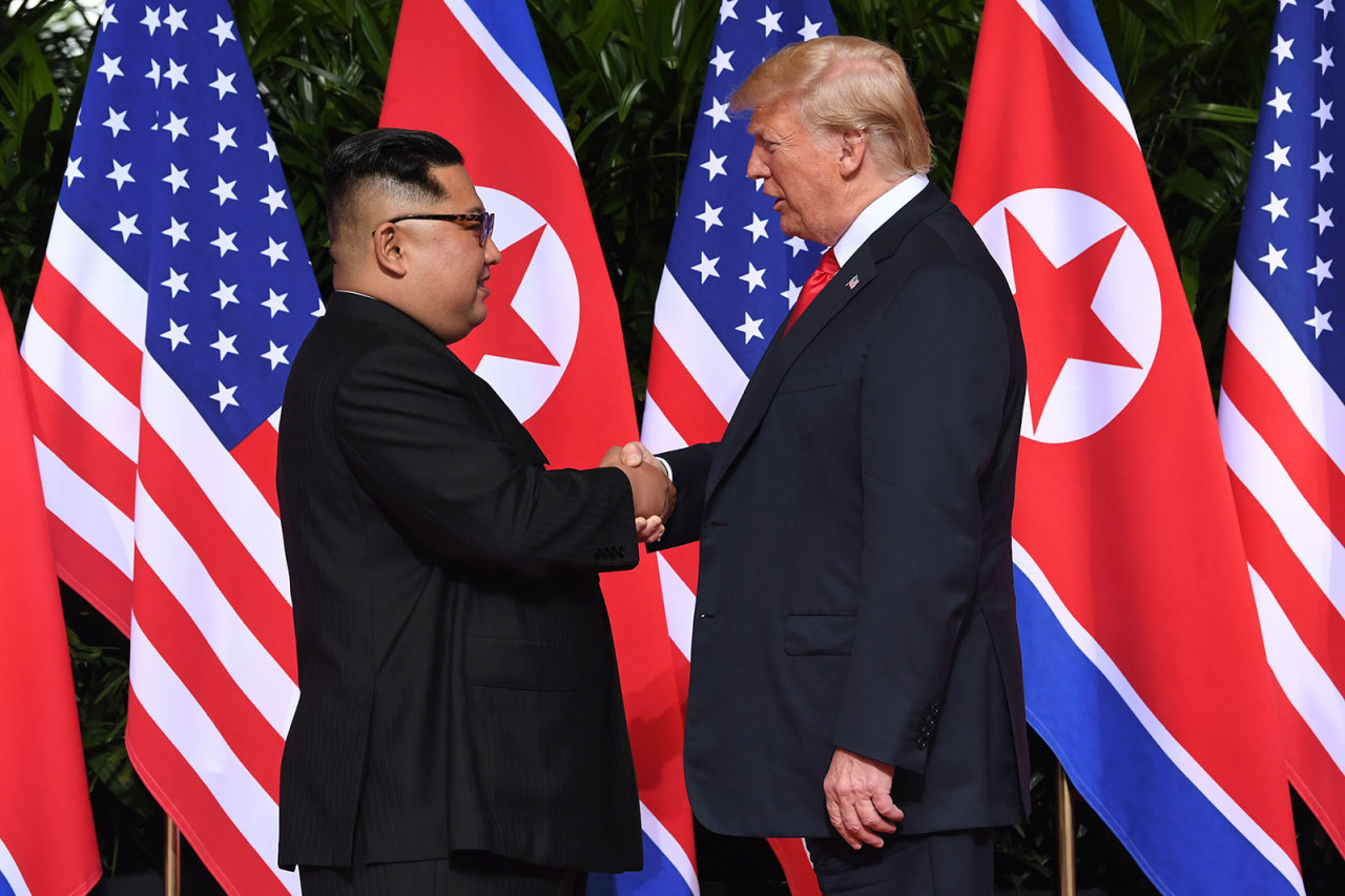 US President Donald Trump (right) and North Korean leader Kim Jong-un. (AFP-Yonhap)