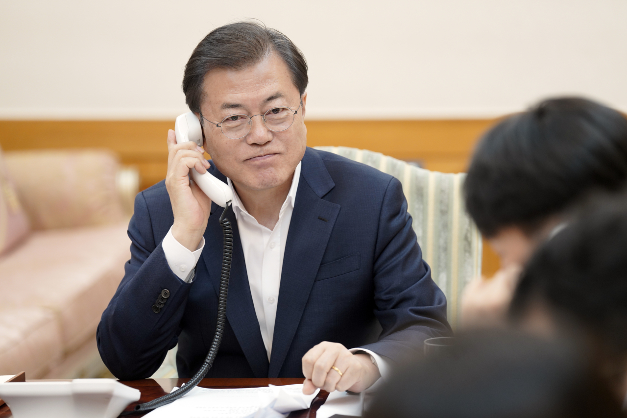 South Korean President Moon Jae-in speaks over the phone with US President Donald Trump on Tuesday. (Yonhap)