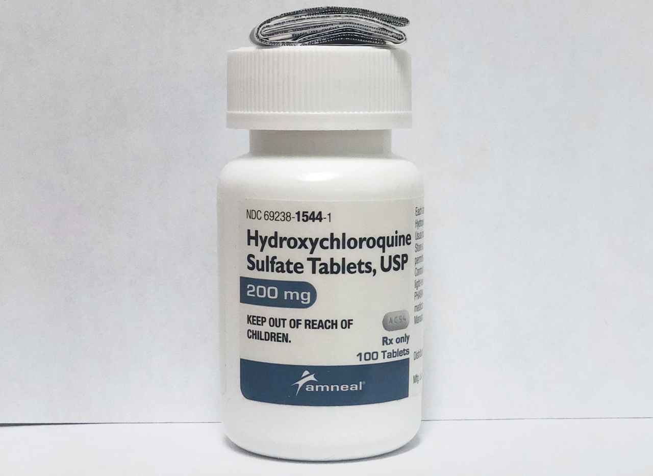 A bottle of hydroxychloroquine 200 mg tablets sits on a pharmacy store shelf in Salem, New York on March 23. (Yonhap0