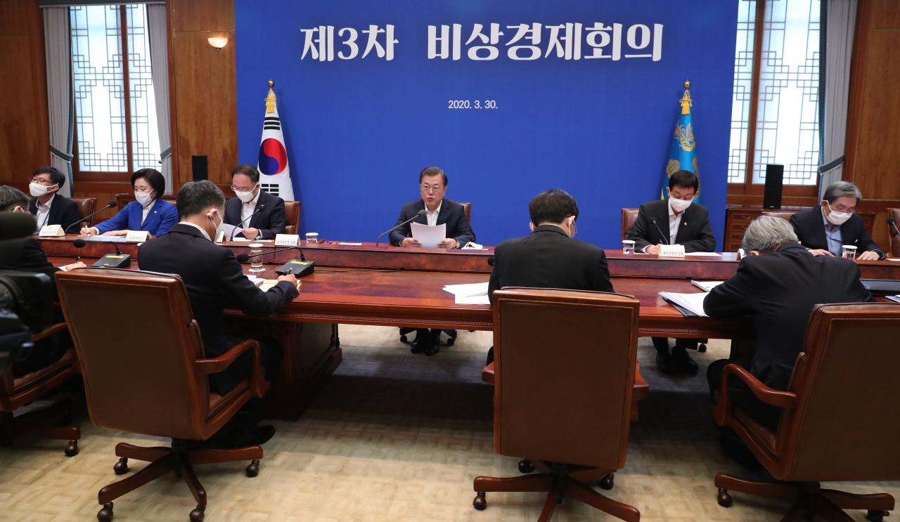 President Moon Jae-in speaks at the economy meeting on Monday. Yonhap