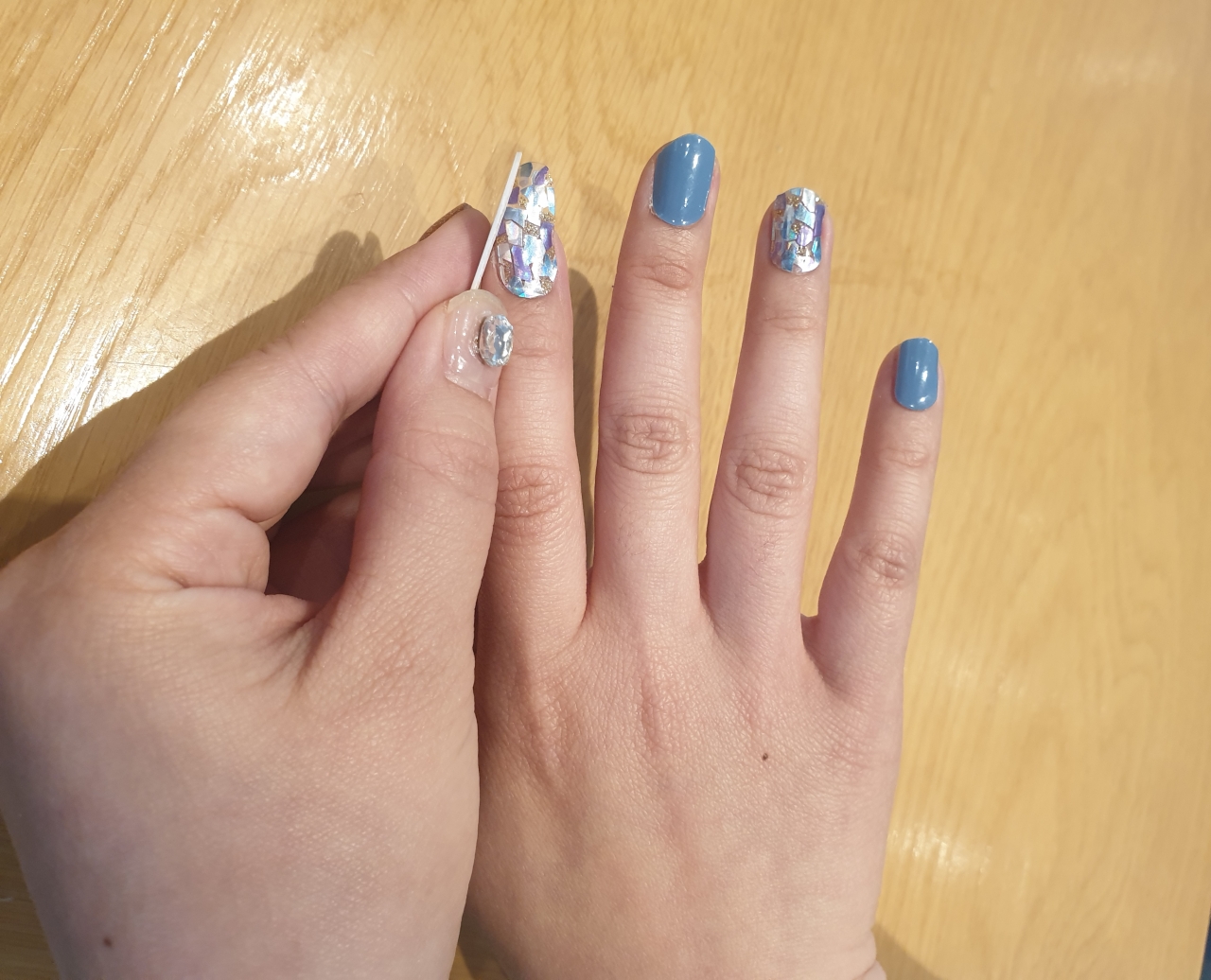 Nail art products such as gel nail stickers come in a variety of colors and designs. (Park Yuna/The Korea Herald)