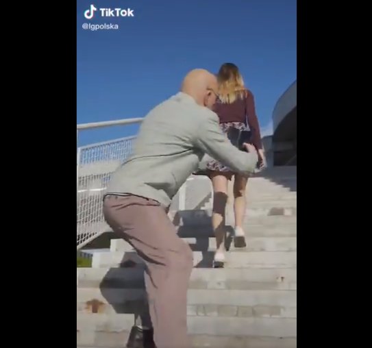 In one of the vidoes posted on LG Poland's official TikTok account, an old man uses LG Electronics' V60 ThinQ dual screen smartphone to take photos of a young woman in front without her consent. (Screen-captured from Twitter)