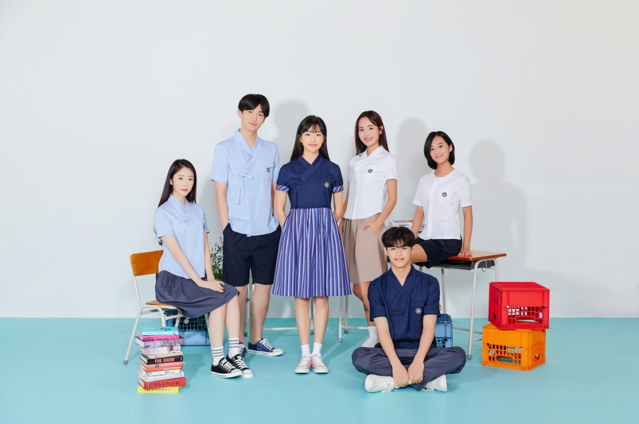 Models wear samples of hanbok-inspired school uniform designs. (KCDF)