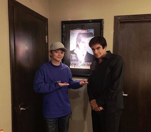 Choi Hyun-woo poses in front of a poster of David Copperfield’s 1995 Seoul show. (Instagram)