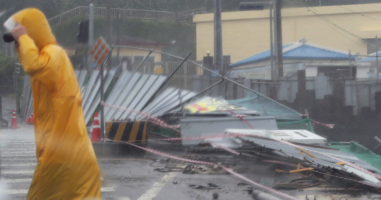 Fences near a construction site in Jeju Island are demolished from strong winds accompanied by typhoon Bavi on Wednesday. (Yonhap)