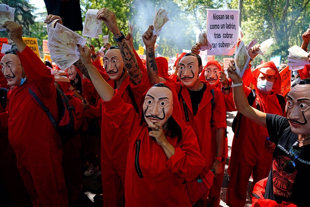 Protesters in costumes protest the closure of the Nissan factory in Barcelona, Spain. (Reuters)